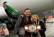 17 December 2014; WBO Middleweight Champion Andy Lee, with his mother Anne Lee, on his return from the USA after defeating Russian Matt Korborov. Shannon Airport, Co Clare. Picture credit: Diarmuid Greene / SPORTSFILE