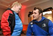 17 December 2014; Leinster Rugby players Dave Kearney, Cian Healy and Jack Conan surprised 30 children from three wonderful charities at a Christmas party at the Conrad Dublin Hotel today.  Conrad Dublin, official hotel to Leinster Rugby, arranged for youngsters from LauraLynn, Heart Children Ireland and Blackrock Flyers Special Olympics Club to meet their sporting heroes, with Santa Claus flying in for the party with gifts for everyone. Pictured are Leinster's Cian Healy and Hughie Brophy aged 11 from Blackrock, Dublin. Conrad Dublin Hotel, Earlsfort Terrace, Dublin. Picture credit: Barry Cregg / SPORTSFILE