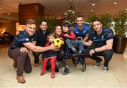 17 December 2014; Leinster Rugby players Dave Kearney, Cian Healy and Jack Conan surprised 30 children from three wonderful charities at a Christmas party at the Conrad Dublin Hotel today.  Conrad Dublin, official hotel to Leinster Rugby, arranged for youngsters from LauraLynn, Heart Children Ireland and Blackrock Flyers Special Olympics Club to meet their sporting heroes, with Santa Claus flying in for the party with gifts for everyone. Pictured are Leinster's Ian Madigan, left, Dave Kearney and Jack Conan with the Rogers Family from left, Colin, Lucy aged 2, Sinead and Jamie aged 4, from Stepaside, Co. Dublin. Conrad Dublin Hotel, Earlsfort Terrace, Dublin. Picture credit: Barry Cregg / SPORTSFILE