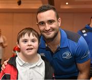 17 December 2014; Leinster Rugby players Dave Kearney, Cian Healy and Jack Conan surprised 30 children from three wonderful charities at a Christmas party at the Conrad Dublin Hotel today.  Conrad Dublin, official hotel to Leinster Rugby, arranged for youngsters from LauraLynn, Heart Children Ireland and Blackrock Flyers Special Olympics Club to meet their sporting heroes, with Santa Claus flying in for the party with gifts for everyone. Pictured are Leinster's Dave Kearney and Cathal McKiernan aged 12, from Booterstown, Dublin. Conrad Dublin Hotel, Earlsfort Terrace, Dublin. Picture credit: Barry Cregg / SPORTSFILE