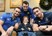 17 December 2014; Leinster Rugby players Dave Kearney, Cian Healy and Jack Conan surprised 30 children from three wonderful charities at a Christmas party at the Conrad Dublin Hotel today.  Conrad Dublin, official hotel to Leinster Rugby, arranged for youngsters from LauraLynn, Heart Children Ireland and Blackrock Flyers Special Olympics Club to meet their sporting heroes, with Santa Claus flying in for the party with gifts for everyone. Pictured are Leinster's Dave Kearney, left, Cian Healy and Jack Conan, with Ethan Nolan aged 7 from Knocklyon, Dublin. Conrad Dublin Hotel, Earlsfort Terrace, Dublin. Picture credit: Barry Cregg / SPORTSFILE