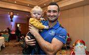 17 December 2014; Leinster Rugby players Dave Kearney, Cian Healy and Jack Conan surprised 30 children from three wonderful charities at a Christmas party at the Conrad Dublin Hotel today.  Conrad Dublin, official hotel to Leinster Rugby, arranged for youngsters from LauraLynn, Heart Children Ireland and Blackrock Flyers Special Olympics Club to meet their sporting heroes, with Santa Claus flying in for the party with gifts for everyone. Pictured are Leinster's Dave Kearney and Finn Delaney aged 17 months from Skerries, Co.Dublin. Conrad Dublin Hotel, Earlsfort Terrace, Dublin. Picture credit: Barry Cregg / SPORTSFILE
