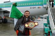 17 December 2014; WBO Middleweight Champion Andy Lee in Limerick on his return from the USA after defeating Russian Matt Korborov. Shannon Airport, Co Clare. Picture credit: Diarmuid Greene / SPORTSFILE