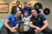 17 December 2014; Leinster Rugby players Dave Kearney, Cian Healy and Jack Conan surprised 30 children from three wonderful charities at a Christmas party at the Conrad Dublin Hotel today.  Conrad Dublin, official hotel to Leinster Rugby, arranged for youngsters from LauraLynn, Heart Children Ireland and Blackrock Flyers Special Olympics Club to meet their sporting heroes, with Santa Claus flying in for the party with gifts for everyone. Pictured are Leinster's Dave Kearney, left, Cian Healy, Ian Madigan and Jack Conan with Ciaran McNamara and his son Cameron aged 9, from Monkstown, Dublin. Conrad Dublin Hotel, Earlsfort Terrace, Dublin. Picture credit: Barry Cregg / SPORTSFILE