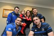 17 December 2014; Leinster Rugby players Dave Kearney, Cian Healy and Jack Conan surprised 30 children from three wonderful charities at a Christmas party at the Conrad Dublin Hotel today.  Conrad Dublin, official hotel to Leinster Rugby, arranged for youngsters from LauraLynn, Heart Children Ireland and Blackrock Flyers Special Olympics Club to meet their sporting heroes, with Santa Claus flying in for the party with gifts for everyone. Pictured are Leinster's Cian Healy, Dave Kearney, Ian Madigan and Jack Conan with the Sinead Rogers and her daughter Lucy aged 2, from Stepaside, Co. Dublin. Conrad Dublin Hotel, Earlsfort Terrace, Dublin. Picture credit: Barry Cregg / SPORTSFILE