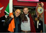 17 December 2014; WBO Middleweight Champion Andy Lee with his trainer Andy Booth, on his return from the USA after defeating Russian Matt Korborov. Shannon Airport, Co Clare. Picture credit: Diarmuid Greene / SPORTSFILE