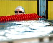 12 August 2007; Florry O'Connell, from Tralee, Co. Kerry, representing Trinity College Dublin and Ireland, watches the clock after his 100m Butterfly Heats. Florry finished 6th in his heat with a time of 58.45 secs which didn't qualify him for the finals. World University Games 2007, 100m Butterfly, Heat 6, Swimming Centre, Thammasat University, Bangkok, Thailand. Picture credit: Brian Lawless / SPORTSFILE