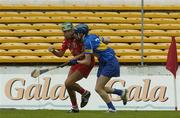 11 August 2007; Orla Cotter, Cork, in action against Una O'Dwyer, Tipperary. Gala All-Ireland Senior Camogie Championship semi-final, Cork v Tipperary, Nowlan Park, Co. Kilkenny. Picture credit: Matt Browne / SPORTSFILE