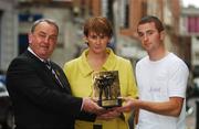 13 August 2007; Monaghan footballer Thomas Freeman is presented with his Vodafone GAA All Stars Player of the Month award for July, in football, by Nickey Brennan, left, President of the GAA, and Carolan Lennon, Director of Marketing, Vodafone, at a luncheon in Dublin. Also honoured was Waterford hurler Dan Shanahan. Westbury Hotel, Dublin. Picture credit: Brendan Moran / SPORTSFILE