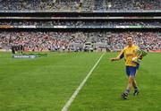 11 August 2007; Roscommon captain Alan Cunniffe leaves the pitch with the Nicky Rackard cup as the Dublin team take to the field before their game. Nicky Rackard Cup Final, Roscommon v Armagh, Croke Park, Dublin. Picture credit; Brendan Moran / SPORTSFILE