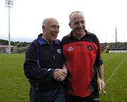 18 August 2007; BT/Northbrook manager Gerry McClory, left, is congratulated by PSNI player manager Gerry Murray after the final whistle. Ulster Inter-Firms Junior Hurling Final, PSNI v BT/Northbrook, Pairc Esler, Newry, Co. Down. Picture credit: Ray Lohan / SPORTSFILE