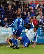 18 August 2007; Thomas Stewart, Linfield, scores past Dungannon Swifts' goalkeeper Dwayne Nelson despite the challenge of Mark McConkey. CIS Insurance Cup, Group A, Dungannon Swifts v Linfield, Stangmore Park, Dungannon, Co. Tyrone. Picture credit: Michael Cullen / SPORTSFILE