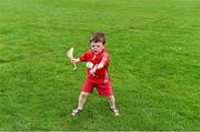 15 June 2014; Ciaran O'Brien, four years, from Midleton, Co. Cork, practices his skills on a back pitch before the game. Munster GAA Hurling Senior Championship, Semi-Final, Clare v Cork, Semple Stadium, Thurles, Co. Tipperary. Picture credit: Ray McManus / SPORTSFILE