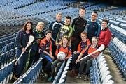 18 December 2014; The GPA Madden Leadership Programme will develop a group of county players from hurling, football and camogie with the necessary skills, motivation and experience to become successful leaders in the community. The Programme, which will run initially for three years, is a bespoke, one-year blended learning Leadership Course which will be delivered by the Gaelic Players Association in conjunction with independent leadership experts. Pictured at the launch of GPA Madden Leadership Programme are, from left, Wexford camogie star Ursula Jacob, Mayo ladies football star Fiona McHale, Armagh footballer Ciaran McKeever, Kerry footballer Paul Murphy, Mayo footballer Cillian O'Connor, Dublin footballer Ger Brennan and Limerick hurler Seamus Hickey with Scoil Neasáin Harmonstown pupils, from left, Rachel Nic Aonghusa, age 12, Niall O Cairbre, age 11, Cúán O Maoileoin, age 12, and Ellen Potts, age 11. Croke Park, Dublin. Picture credit: Ramsey Cardy / SPORTSFILE