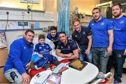 18 December 2014; Leinster players, from left, Jack McGrath, Luke McGrath, Jack Conan, James Tracy, Aaron Dundon and Michael Bent, with eight year old Sean Bridson, Riverston Abbey, Dublin, during a visit to Temple Street Children's Hospital. Members of the Leinster Rugby Team visited the patients in Temple Street this afternoon to spread some Christmas cheer. Temple Street Children's Hospital, Dublin. Picture credit: Matt Browne / SPORTSFILE