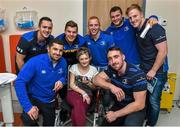 18 December 2014; Leinster players, from left, Colm O'Shea, Rob Kearney, Jordi Murphy, Darragh Fanning, Jack Conan, front right, Jack McGrath and James Tracy, with 14 year old Karen May, Artane, Dublin, during a visit to Temple Street Children's Hospital. Members of the Leinster Rugby Team visited the patients in Temple Street this afternoon to spread some Christmas cheer. Temple Street Children's Hospital, Dublin. Picture credit: Matt Browne / SPORTSFILE