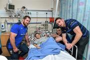 18 December 2014; Leinster players, from left, Michael Bent, Cian Healy and Jack Conan with 11 year old Tom Brennan, Navan Road, Dublin 7, during a visit to Temple Street Children's Hospital. Members of the Leinster Rugby Team visited the patients in Temple Street this afternoon to spread some Christmas cheer. Temple Street Children's Hospital, Dublin. Picture credit: Matt Browne / SPORTSFILE