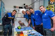 18 December 2014; Leinster players, from left, Jordi Murphy, Darragh Fanning, Jack Conan, Rob Kearney and Aaron Dundon, with 2 year old Billy Goulding, Birr, Co. Offaly, during a visit to Temple Street Children's Hospital. Members of the Leinster Rugby Team visited the patients in Temple Street this afternoon to spread some Christmas cheer. Temple Street Children's Hospital, Dublin. Picture credit: Matt Browne / SPORTSFILE