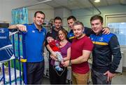 18 December 2014; Leinster players, from left, Shane Jennings, Fergus McFadden, Noel Reid and Sam Coghlan Murray, with 6 mounth old Seimi Brennan, Balbriggan Co. Dublin, along with dad David and mother Arna, during a visit to Temple Street Children's Hospital. Members of the Leinster Rugby Team visited the patients in Temple Street this afternoon to spread some Christmas cheer. Temple Street Children's Hospital, Dublin. Picture credit: Matt Browne / SPORTSFILE