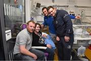 18 December 2014; Leinster players Jack McGrath and Fergus McFadden with 3 day old Frankie Cluskey, from Navan, Co. Meath, with dad David and mother Alison during a visit to Temple Street Children's Hospital. Members of the Leinster Rugby Team visited the patients in Temple Street this afternoon to spread some Christmas cheer, Dublin. Picture credit: Matt Browne / SPORTSFILE