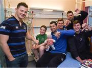 18 December 2014; 8 year old Andrew Burke, from Whitegate, Co. Clare, with, from left, Leinster's Sam Coghlan Murray, Rob Kearney, Jordi Murphy, Fergus McFadden, and Brendan Macken during a visit to Temple Street Children's Hospital. Members of the Leinster Rugby Team visited the patients in Temple Street this afternoon to spread some Christmas cheer, Dublin. Picture credit: Matt Browne / SPORTSFILE