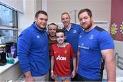 18 December 2014; Leinster player Jack McGrath, Darragh Fanning and Michael Bent with 14 year old Dean O'Connor and his father Brian, from Leixlip, Co. Kildare, during a visit to Temple Street Children's Hospital. Members of the Leinster Rugby Team visited the patients in Temple Street this afternoon to spread some Christmas cheer, Dublin. Picture credit: Matt Browne / SPORTSFILE