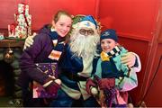 19 December 2014; Leinster fans Emma, age 12, and Ruth O'Driscoll, age 9, from Kilbride, Co. Wicklow, in santa's grotto before the game. Guinness PRO12, Round 10, Leinster v Connacht. RDS, Ballsbridge, Dublin. Picture credit: Ramsey Cardy / SPORTSFILE