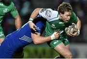 19 December 2014; Kieran Marmion, Connacht, is tackled by Jordi Murphy, Leinster. Guinness PRO12, Round 10, Leinster v Connacht. RDS, Ballsbridge, Dublin. Picture credit: Ramsey Cardy / SPORTSFILE
