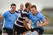 20 December 2014; Peadar Timmins, UCD, is tackled by Kyle McCoy, Terenure. Ulster Bank League Division 1A, Terenure v UCD. Lakelands Park, Terenure, Dublin. Picture credit: Piaras Ó Mídheach / SPORTSFILE