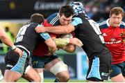 20 December 2014; Munster's Peter O'Mahony is tackled by Glasgow Warriors' Fraser Brown, left, and Josh Strauss. Guinness PRO12, Round 10, Glasgow Warriors v Munster, Scotstoun Stadium, Glasgow, Scotland. Picture credit: Gary Hutchison / SPORTSFILE
