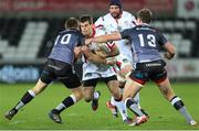 20 December 2014; Louis Ludik, Ulster, is tackled by Dan Biggar and Ashley Beck, Ospreys. Guinness PRO12, Round 10, Ospreys v Ulster, Liberty Stadium, Swansea, Wales. Picture credit: Steve Pope / SPORTSFILE