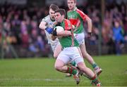 21 December 2014; Liam McGrath, Loughmore-Castleiney, in action against Liam Casey, Cahir. Tipperary Senior Football Championship Final, Loughmore-Castleiney v Cahir, Leahy Park, Cashel, Co. Tipperary. Picture credit: Matt Browne / SPORTSFILE