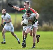21 December 2014; Conor Casey, Cahir, in action against Noel McGrath, Loughmore-Castleiney. Tipperary Senior Football Championship Final, Loughmore-Castleiney v Cahir, Leahy Park, Cashel, Co. Tipperary. Picture credit: Matt Browne / SPORTSFILE