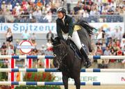 17 August 2007; Ireland's Marie Burke, on Chippison, in action during the International Jumping Competition - Qualifier Grand Prix. FEI European Show Jumping Championships 2007, MVV Riding Stadium, Mannheim, Germany. Photo by Sportsfile  *** Local Caption ***