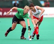 18 August 2007; Nikki Symmons, Ireland, in action against Anne Panter, England. 2007 EuroHockey Nations Championships, Womens, Pool A, Ireland v England, Belle Vue Hockey Centre, Kirkmanshulme Lane, Belle Vue, Manchester, England. Picture credit: Oliver McVeigh / SPORTSFILE
