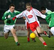 10 February 2007; Kevin Hughes, Tyrone, in action against Martin McGrath, Fermanagh. Allianz National Football League, Division 1A, Round 2, Tyrone v Fermanagh, Healy Park, Omagh, Co. Tyrone. Picture Credit: Oliver McVeigh / SPORTSFILE