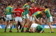 19 August 2007; Meath players, from left, Brian Farrell, Shane O'Rourke, Nigel Crawford and Seamus Kenny tussel with Cork players, from left, Noel O'Leary, Michael Shields and John Miskella, while Graham Geraghty, Meath, lies on the ground during the game. Bank of Ireland All-Ireland Senior Football Championship Semi-Final, Meath v Cork, Croke Park, Dublin. Picture credit; Stephen McCarthy / SPORTSFILE *** Local Caption ***