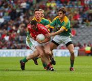 19 August 2007; Noel O'Leary, Cork, in action against John Donegan, left, Graham Geraghty, and Brian Farrell, Meath. Bank of Ireland All-Ireland Senior Football Championship Semi-Final, Meath v Cork, Croke Park, Dublin. Picture credit; Stephen McCarthy / SPORTSFILE *** Local Caption ***