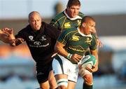 21 August 2007; Ricky Januarie, South Africa, is tackled by Adrian Flavin, Connacht. Rugby World Cup Warm Up Game, Connacht v South Africa, Sportsground, Galway. Photo by Sportsfile *** Local Caption ***