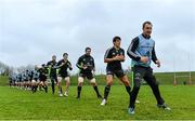 22 December 2014; Munster players including Johne Murphy, Donncha O'Callaghan and Billy Holland warm up during squad training ahead of their Guinness PRO12, Round 11, match against Leinster on Friday. Munster Rugby Squad Training, University of Limerick, Limerick Picture credit: Diarmuid Greene / SPORTSFILE