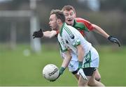 21 December 2014; James McGrath, Cahir, in action against Tom King, Loughmore-Castleiney. Tipperary Senior Football Championship Final, Loughmore-Castleiney v Cahir, Leahy Park, Cashel, Co. Tipperary. Picture credit: Matt Browne / SPORTSFILE