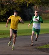 25 December 2014; Daire Bermingham, left, of the host club Raheny Shamrock AC, on his way to winning the 'Billy Peppard Perpetual Cup' from Kieran Kelly. The annual Christmas Morning Race, in aid of GOAL, is run in St Annes Park, Raheny, Dublin.