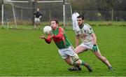 26 December 2014; Derek Bourke, Loughmore-Castleiney, in action against Aidan Casey, Cahir. Tipperary Senior Football Championship Final Replay, Loughmore-Castleiney v Cahir, Leahy Park, Cashel, Co. Tipperary. Picture credit: Ray McManus / SPORTSFILE