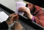 26 December 2014; A supporter purchases a ticket for the game. Tipperary Senior Football Championship Final Replay, Loughmore-Castleiney v Cahir, Leahy Park, Cashel, Co. Tipperary. Picture credit: Ray McManus / SPORTSFILE