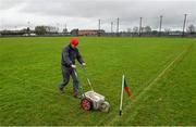 26 December 2014; Groundsman John Paul Peters lines the pitch before the game. Tipperary Senior Football Championship Final Replay, Loughmore-Castleiney v Cahir, Leahy Park, Cashel, Co. Tipperary. Picture credit: Ray McManus / SPORTSFILE