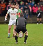 26 December 2014; Referee Sean Lonergan throws in the ball to start the game. Tipperary Senior Football Championship Final Replay, Loughmore-Castleiney v Cahir, Leahy Park, Cashel, Co. Tipperary. Picture credit: Ray McManus / SPORTSFILE