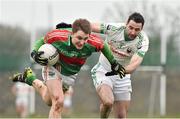 26 December 2014; Cian Hennessy, Loughmore-Castleiney, in action against Gerald Hally, Cahir. Tipperary Senior Football Championship Final Replay, Loughmore-Castleiney v Cahir, Leahy Park, Cashel, Co. Tipperary. Picture credit: Ray McManus / SPORTSFILE