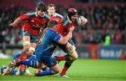 26 December 2014; Tommy O'Donnell, Munster, supported by team-mate Donncha O'Callaghan, is tackled by Tadhg Furlong, Leinster. Guinness PRO12, Round 11, Munster v Leinster, Thomond Park, Limerick. Picture credit: Diarmuid Greene / SPORTSFILE