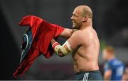 26 December 2014; Munster's BJ Botha gets some encouragement from supporters as he puts his jersey back on after losing it during the game. Guinness PRO12, Round 11, Munster v Leinster, Thomond Park, Limerick. Picture credit: Diarmuid Greene / SPORTSFILE