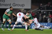 26 December 2014; Tom McCartney, Connacht, is tackled by Dan Tuohy, left, and Clive Ross, Ulster. Guinness PRO12, Round 11, Ulster v Connacht, Kingspan Stadium, Ravenhill Park, Belfast, Co. Down. Picture credit: Ramsey Cardy / SPORTSFILE